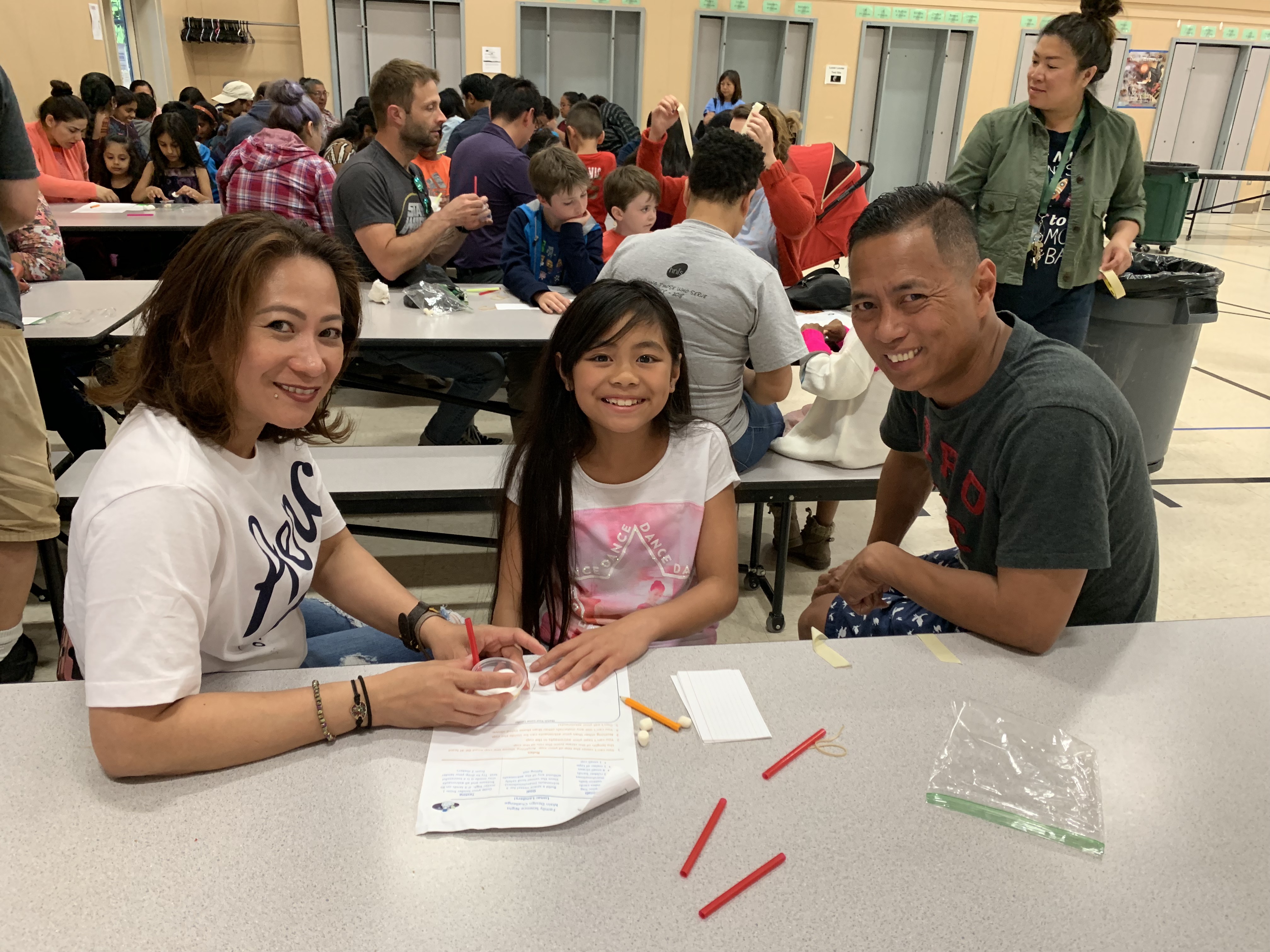 Family sitting down at Family Science Night